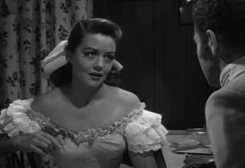 A screenshot of the movie Too Much, Too Soon