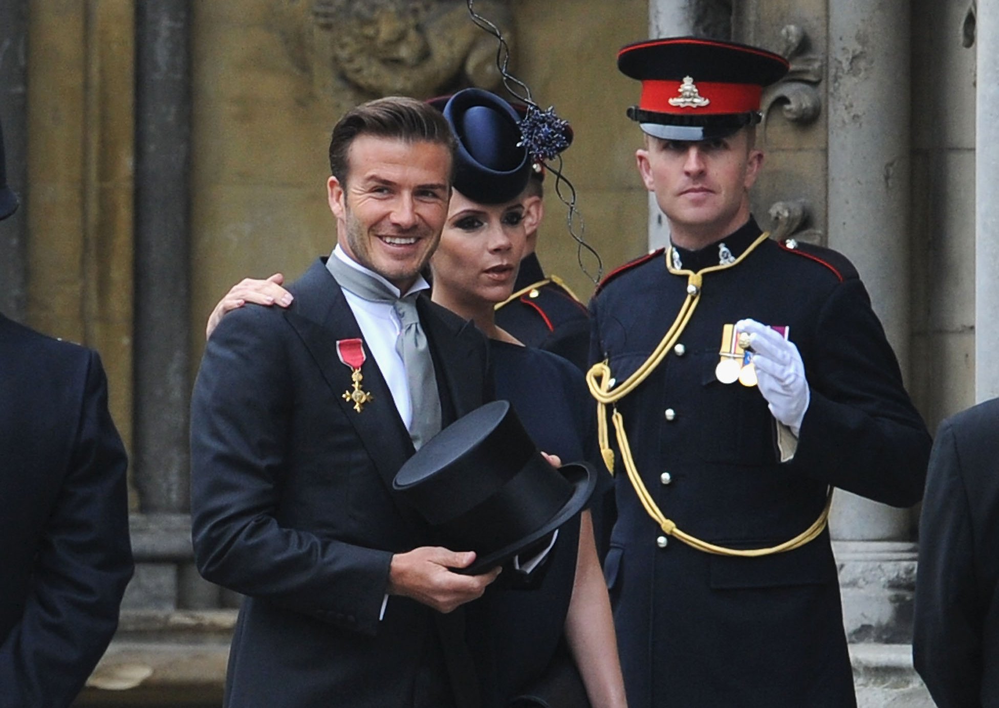 avid Beckham and Victoria Beckham arrive to attend the Royal Wedding