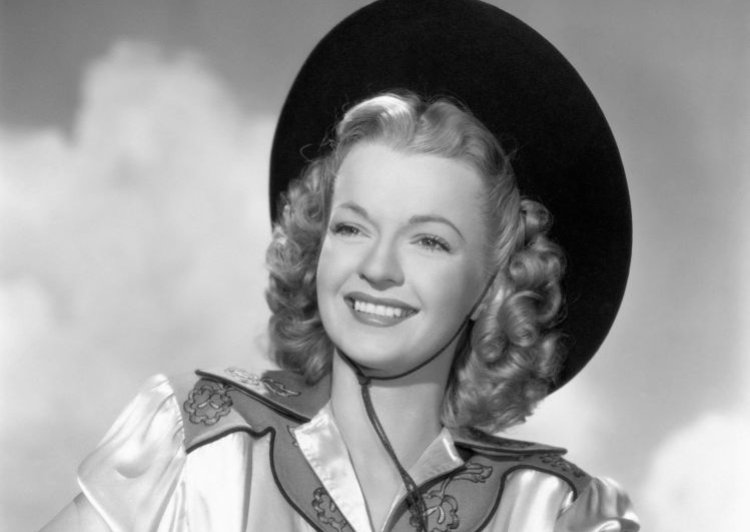 American actress Dale Evans in a Western outfit for a promotional portrait