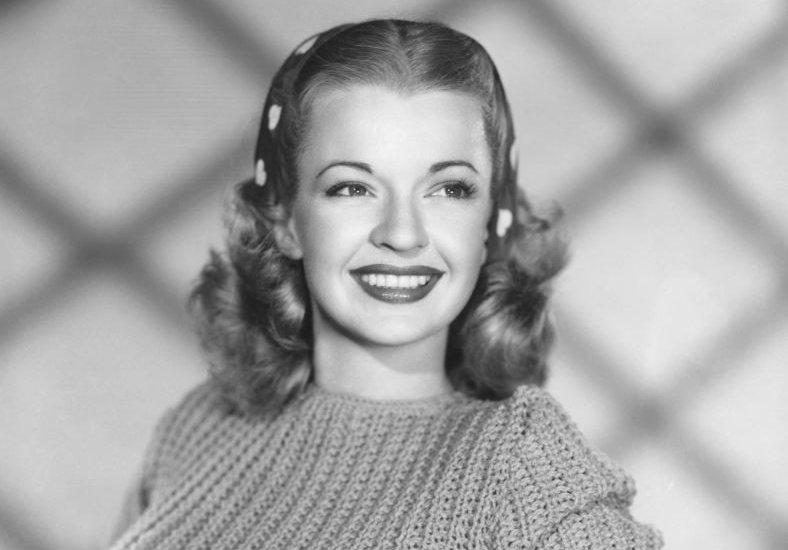 Studio portrait of Dale Evans smiling