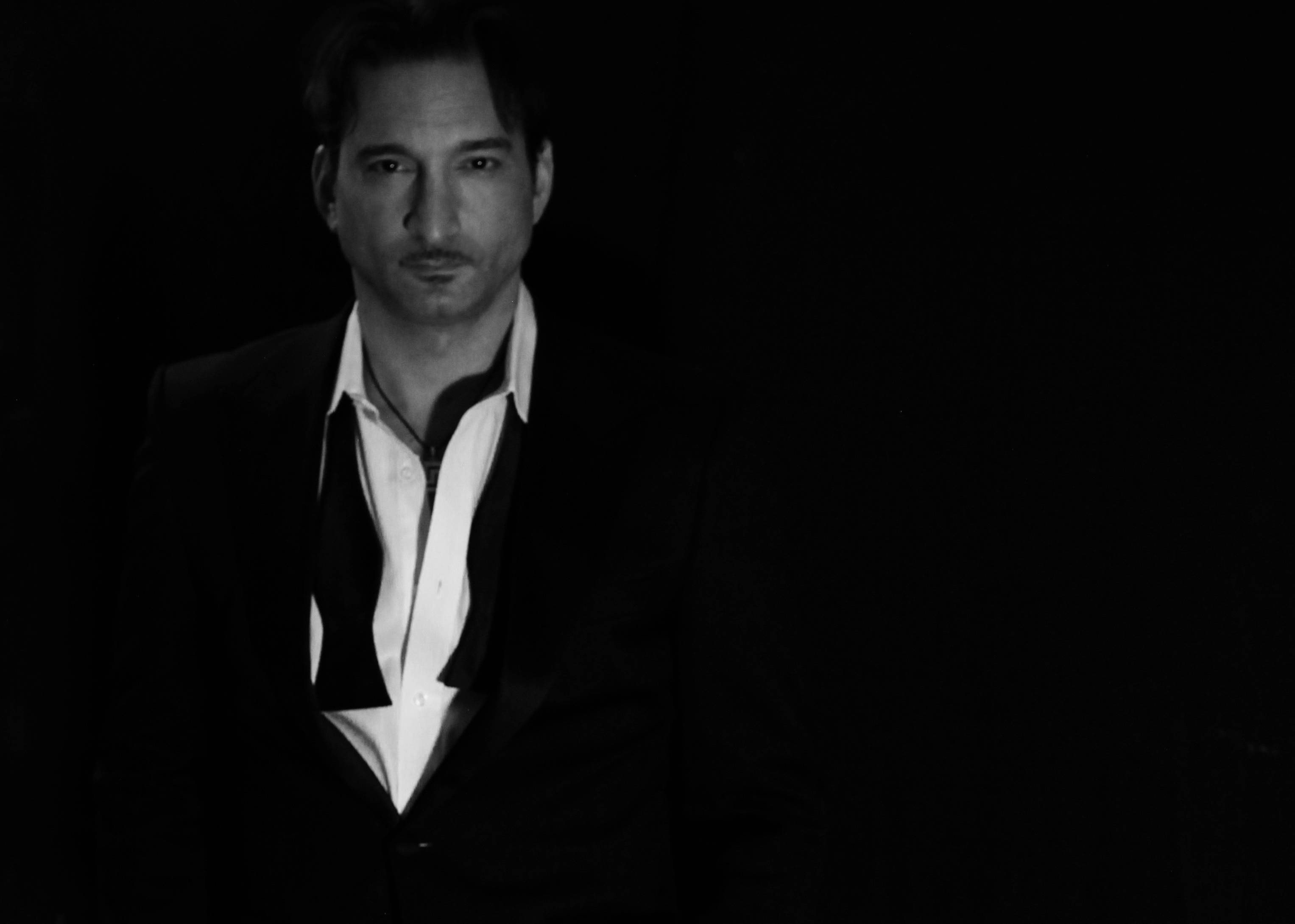 Johnny Bacolas in suit