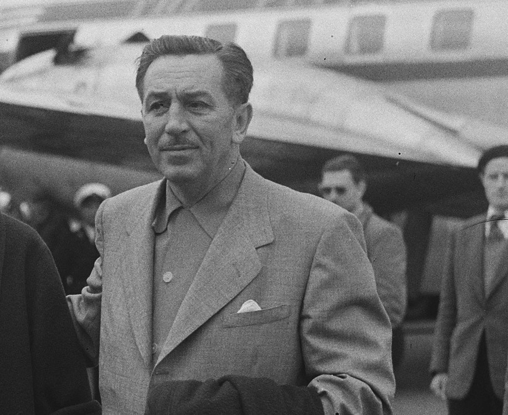 Grayscale Portrait Photo of American animator and film producer Walt Disney.