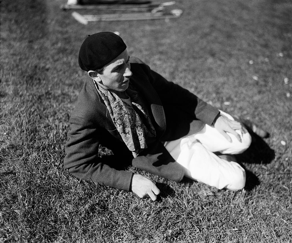 Grayscale Portrait Photo of American animator and film producer Walt Disney.