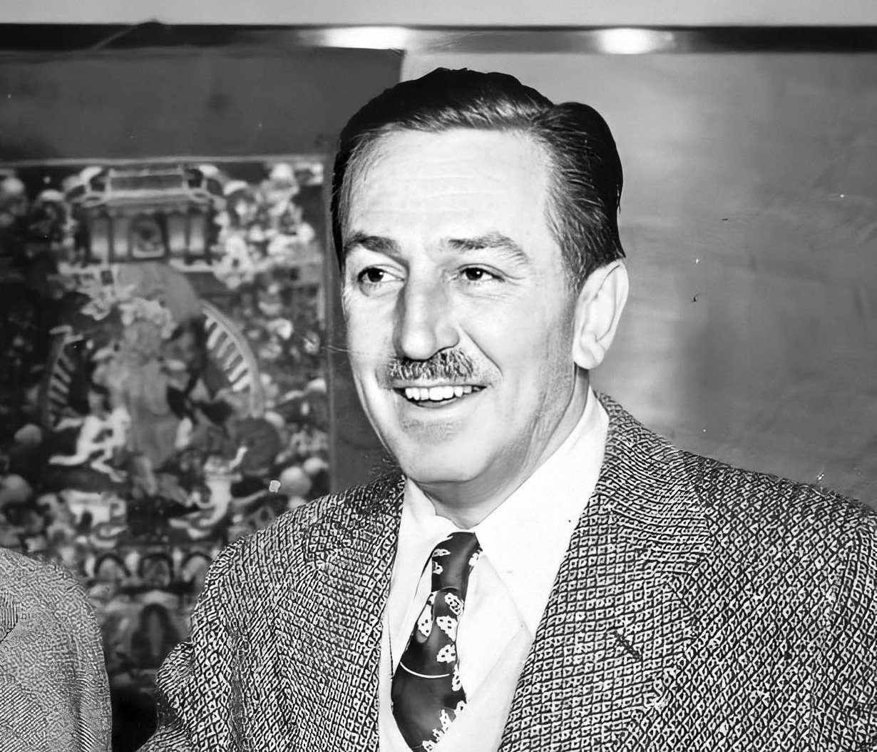 Grayscale Portrait Photo of American animator and film producer Walt Disney.