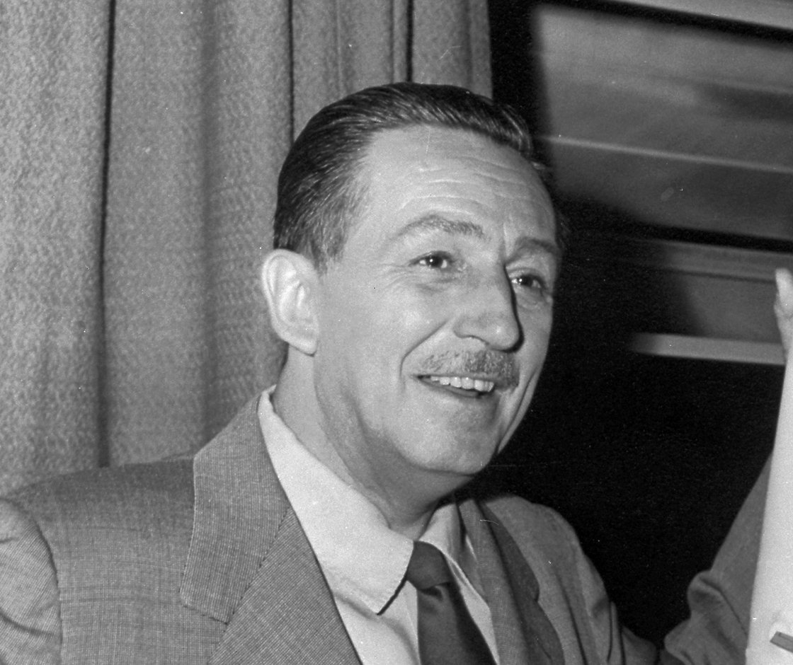 Grayscale Portrait Photo of American animator and film producer Walt Disney.