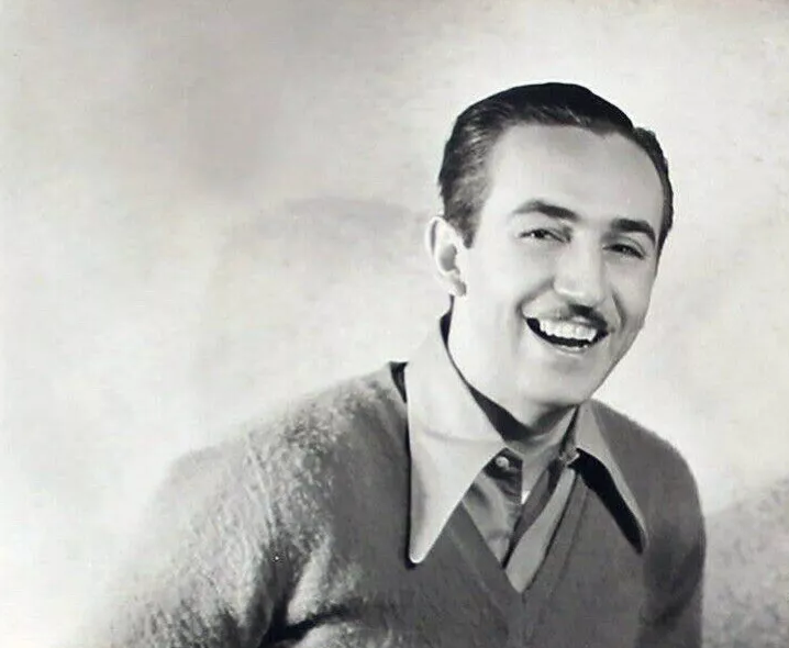Grayscale Portrait Photo of American animator and film producer Walt Disney.