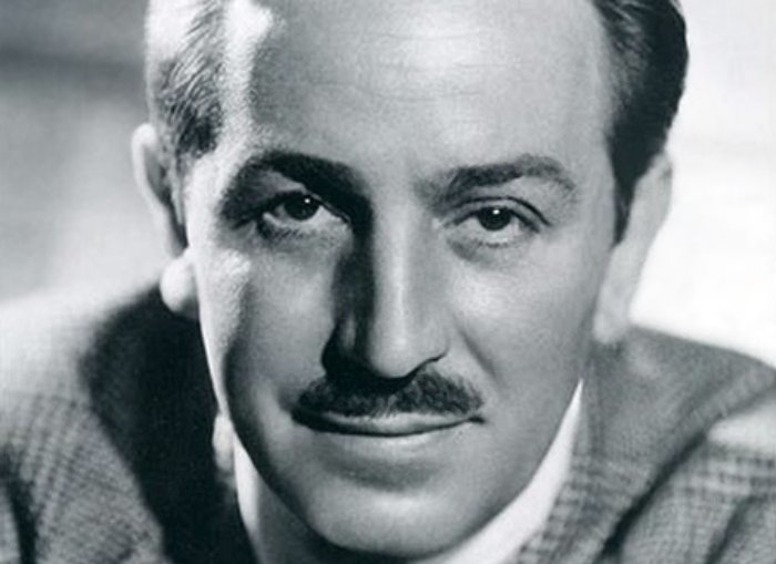Grayscale Portrait Photo of American animator and film producer Walt Disney.