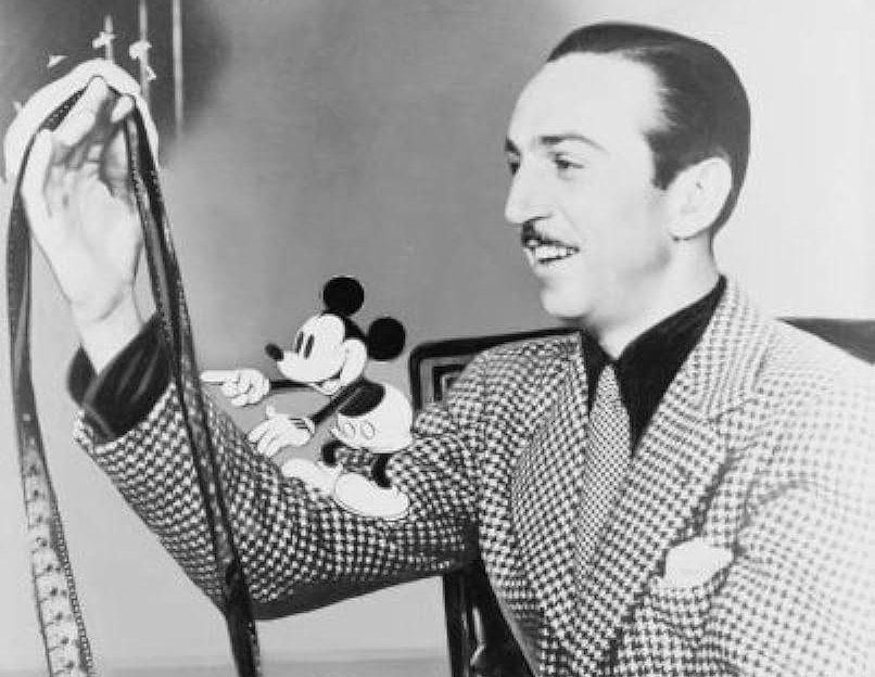 Grayscale Portrait Photo of American animator and film producer Walt Disney.