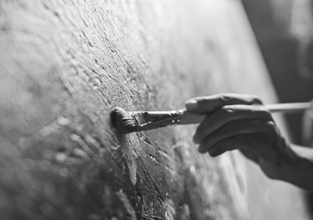 Artist Works on Abstract Oil Painting, Moving Paint Brush Energetically