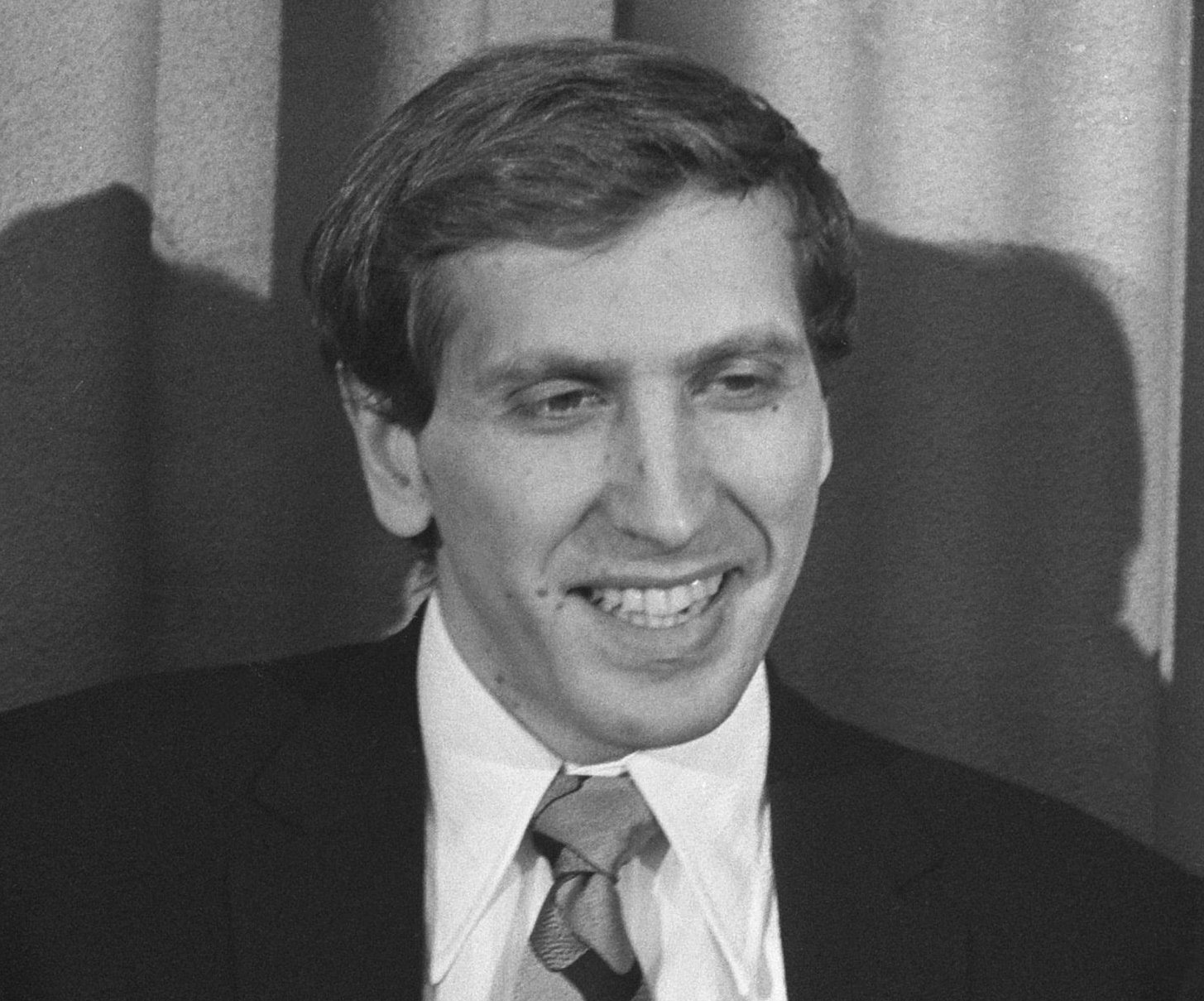 Grayscale Portrait Photo of American chess grandmaster Bobby Fischer