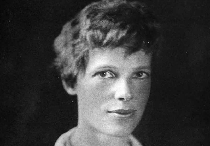 A portrait of Amelia Earhart looking at the camera