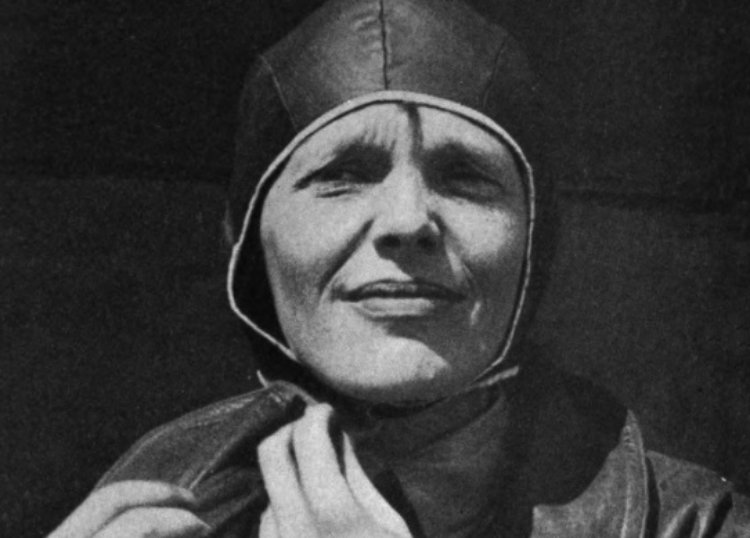 Photo of Amelia Earhart preparing for flight