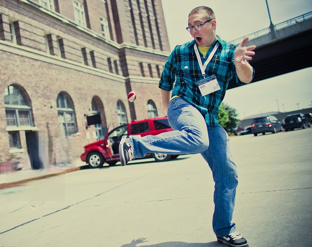Man Playing With Hacky Sack