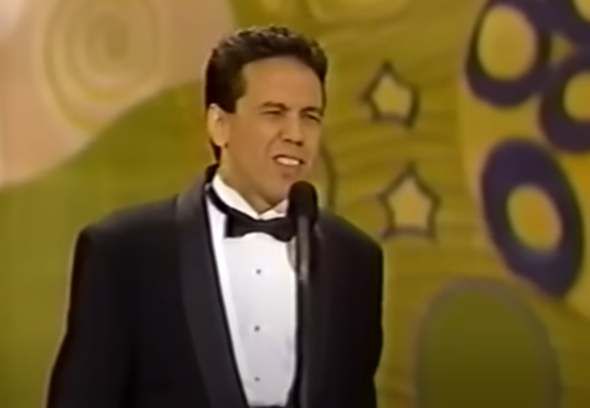 Screenshot of the video Gilbert Gottfried presenting at the 1991 Emmys.