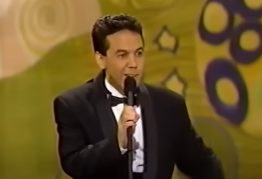 Screenshot of the video Gilbert Gottfried presenting at the 1991 Emmys.