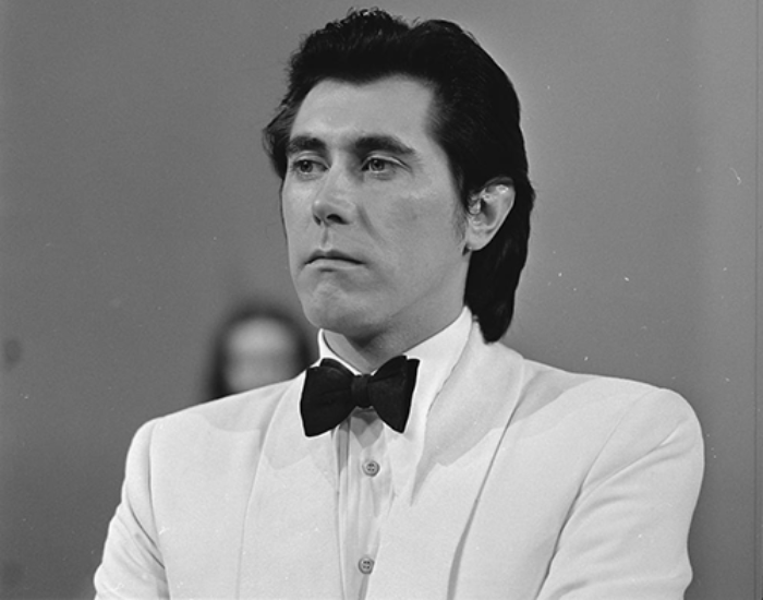 Grayscale Portrait Photo of English musician Bryan Ferry