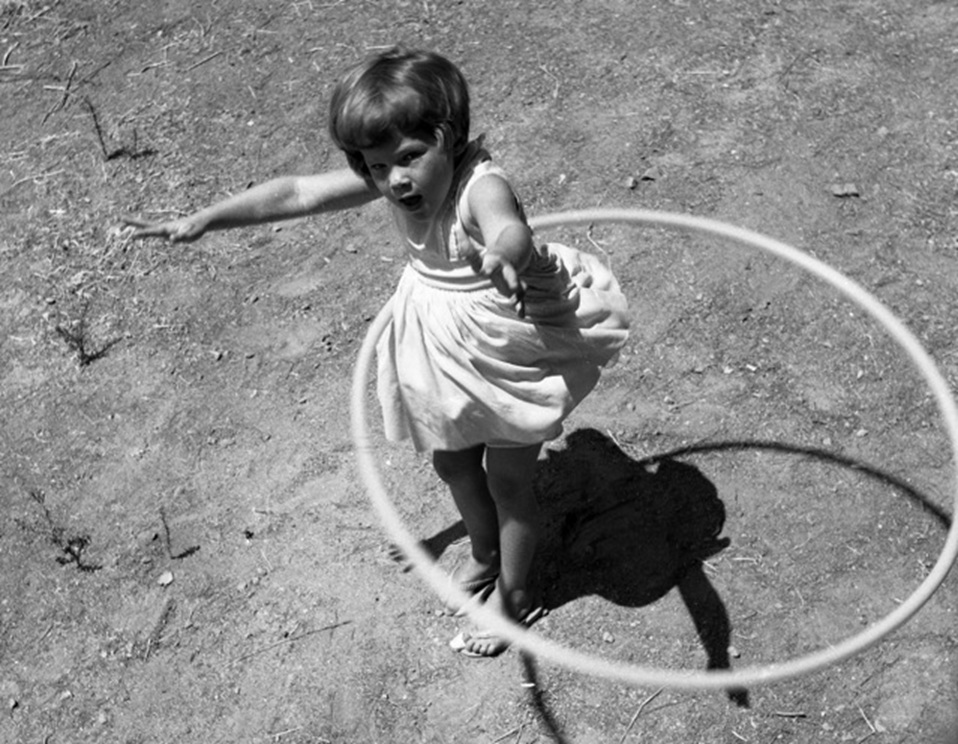 Girl Twirling Hula Hoop, 1958