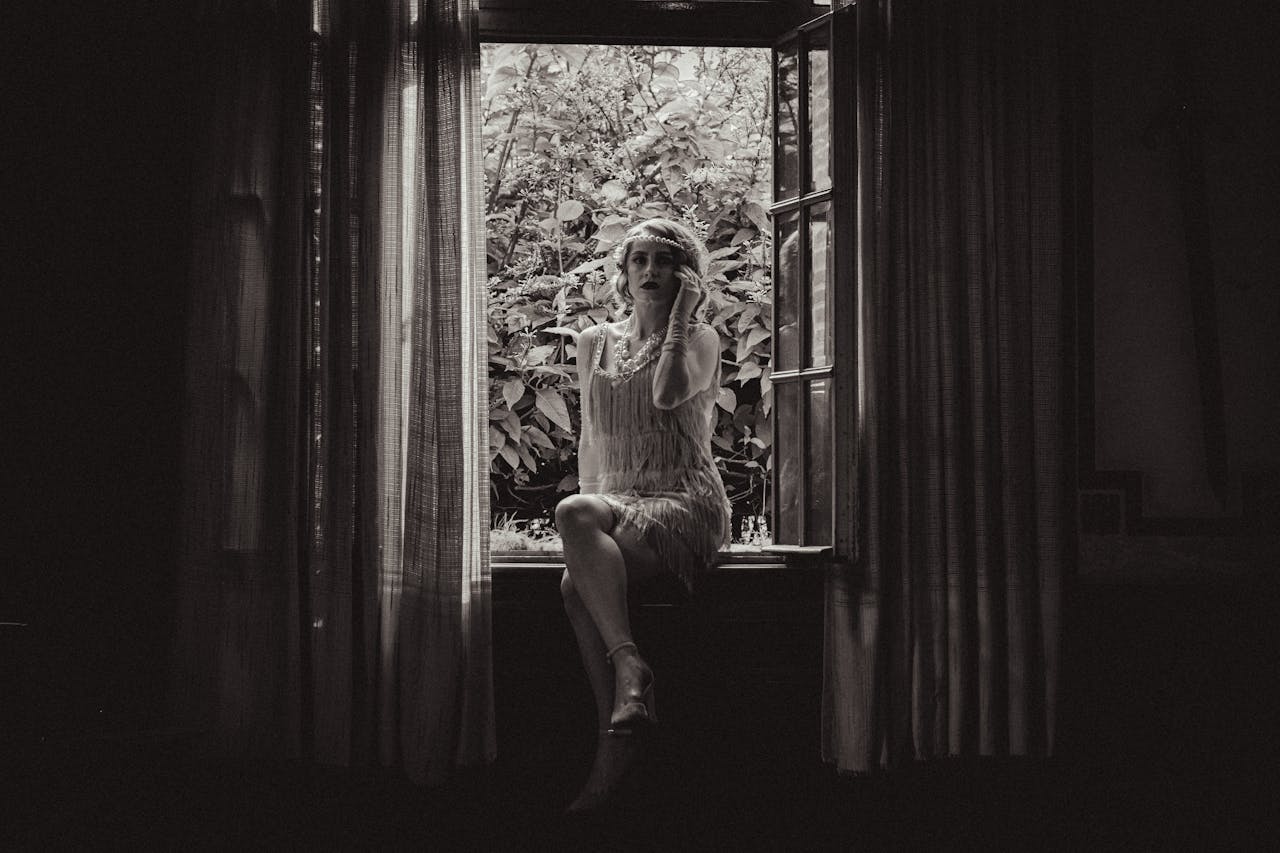 Sitting on Sill Woman in Flapper Dress