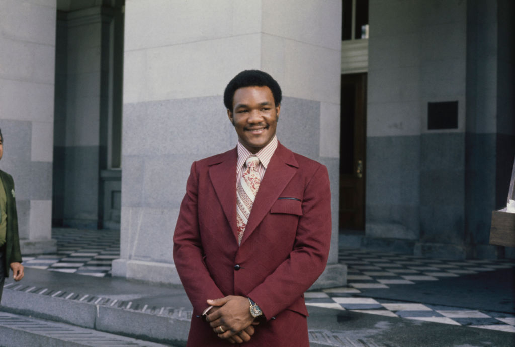 Close-up of boxer George Foreman in suit