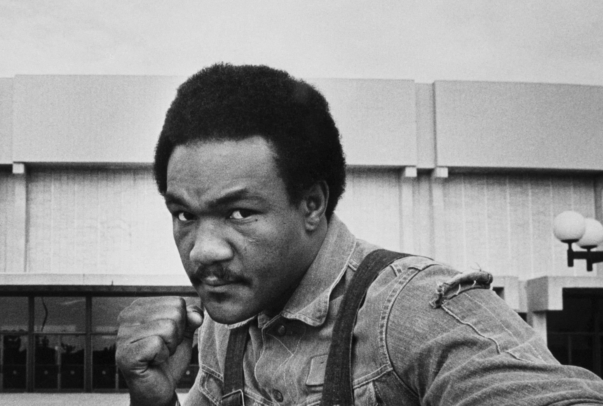 Heavyweight contender George Foreman strikes a fighting pose