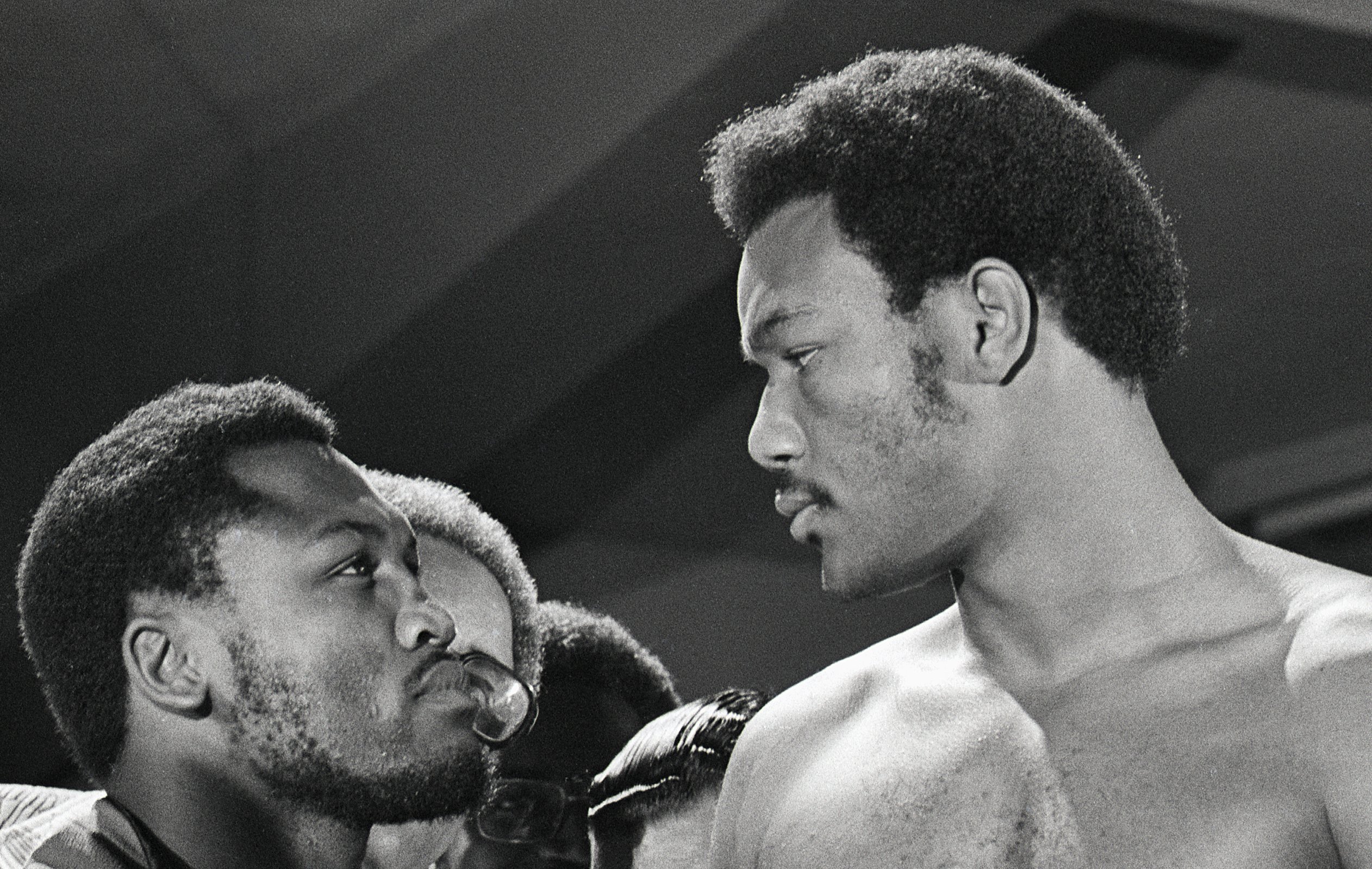 World heavyweight champion Joe Frazier (L) and challenger George Foreman