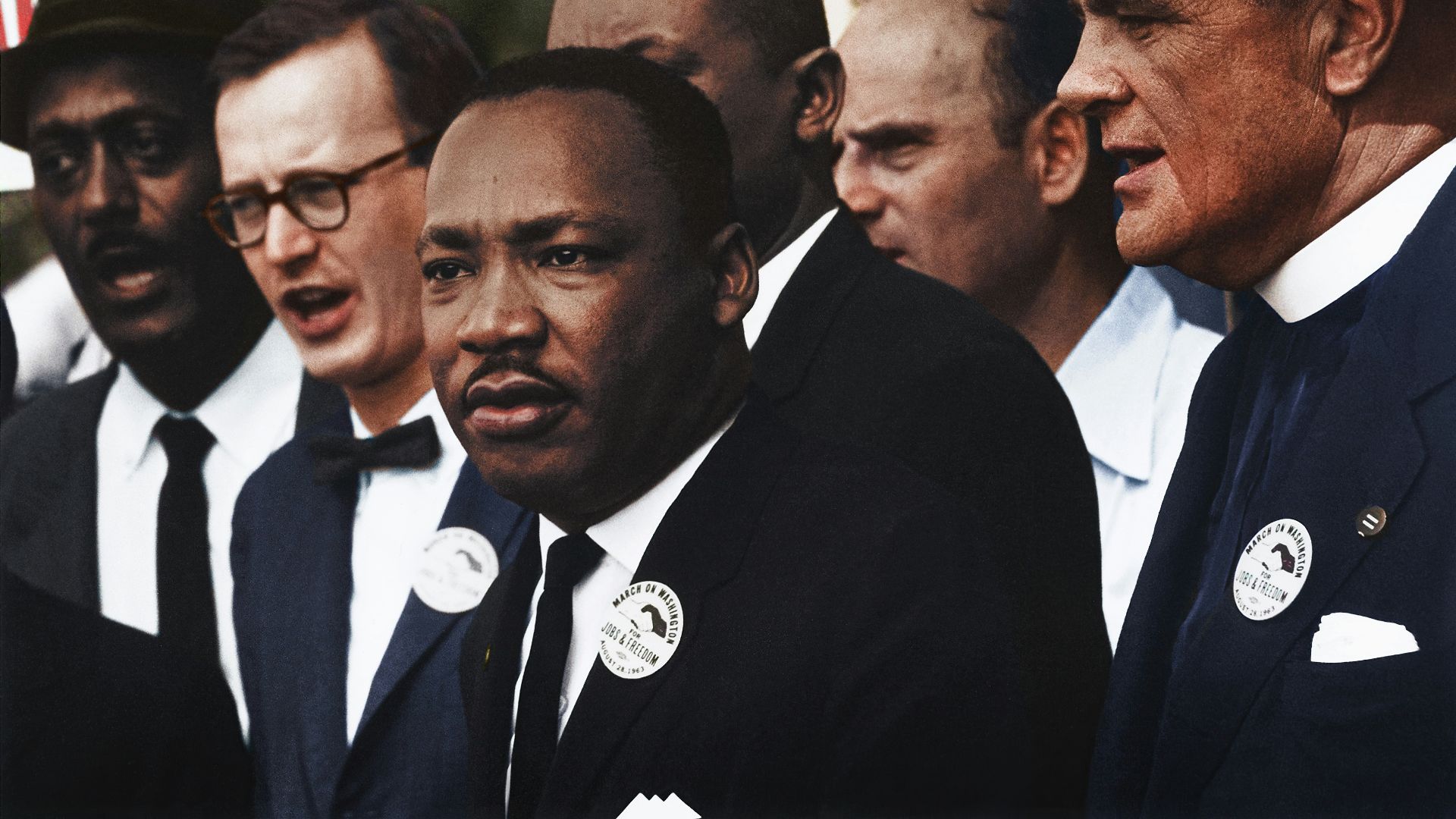 Dr. Martin Luther King, Jr. and Mathew Ahmann in a crowd of demonstrators at the March on Washington