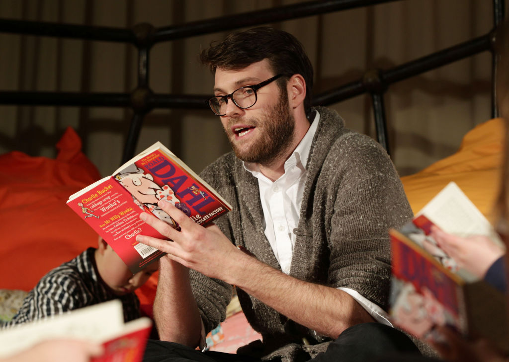 Roald Dahl's grandson Luke Kelly reading to a group of children