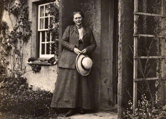 Beatrix Potter in front of her house