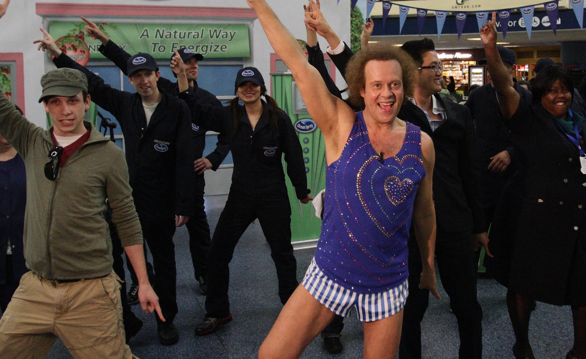 Fitness expert Richard Simmons revitalizes NYC commuters in Penn Station