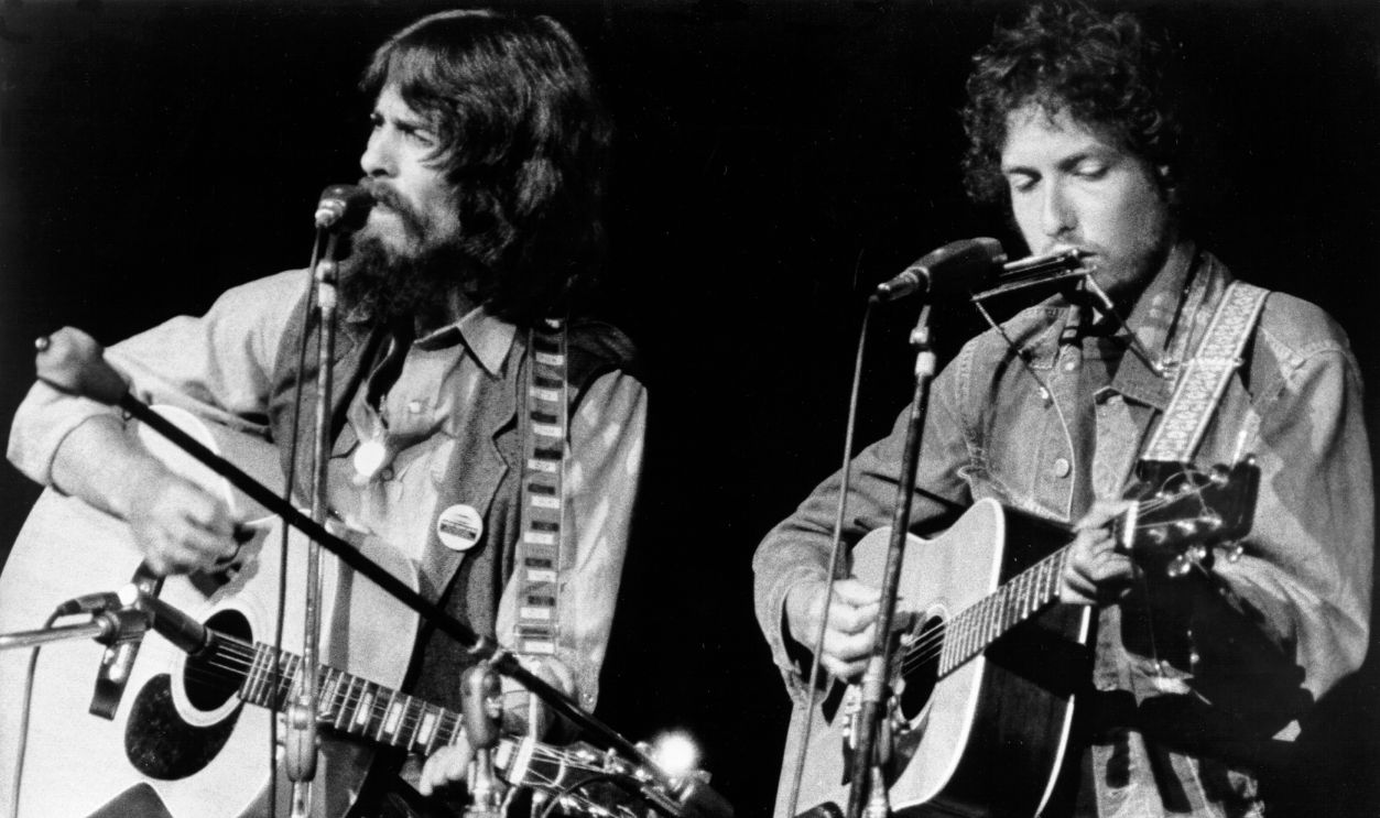 Concert For Bangladesh NEW YORK - AUGUST 1: George Harrison and Bob Dylan perform onstage at the Concert for Bangladesh which was held at Madison Square Garden on August 1, 1971 in New York City, New York. 