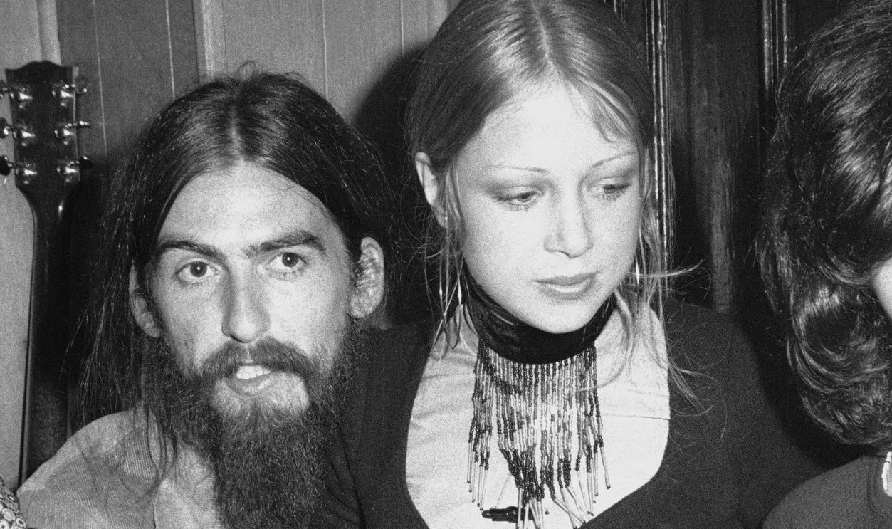 Musician George Harrison & First Wife British popular rock and roll guitarist and singer George Harrison (1943 - 2001), formerly of the Beatles, and his first wife model Patti Boyd have their picture taken at a party, 1971. The two were tempestuously married from 1966 to 1977. 