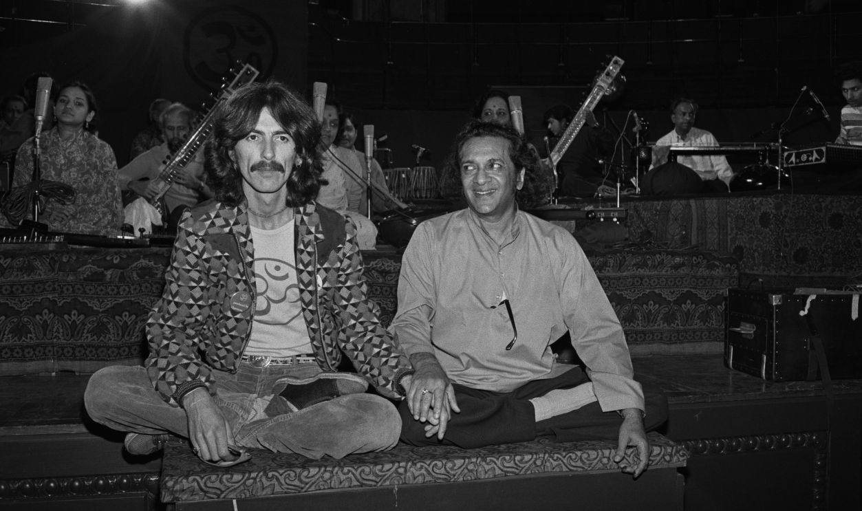 Collaborations Former Beatles guitarist George Harrison (1943 - 2001, left) and Indian classical sitarist Ravi Shankar (1920 - 2012) perform in the 'Music Festival from India' at the Royal Albert Hall, London, UK, 23rd September 1974. The show was recorded and released as part of the 'Collaborations' compilation. 