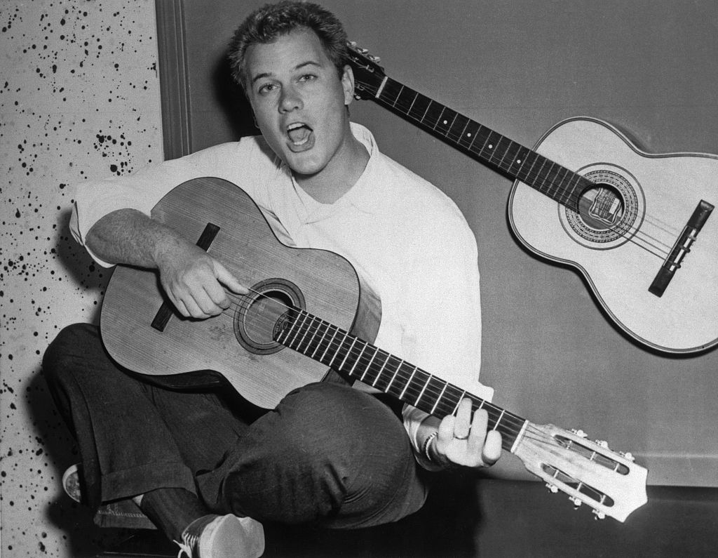 Grayscale Portrait Photo of American film and television actor Larry Hagman