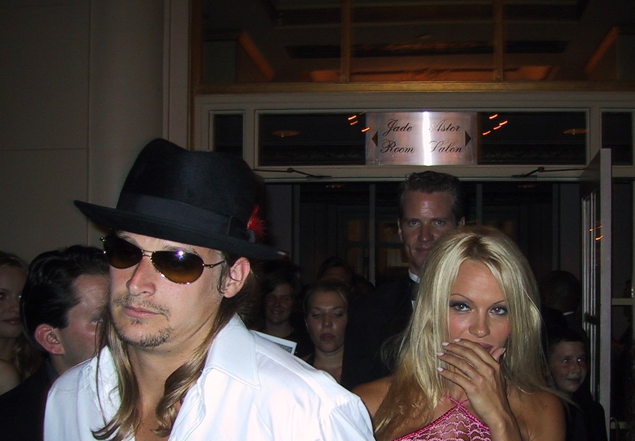 Pamela Anderson and Kid Rock Holding Hands