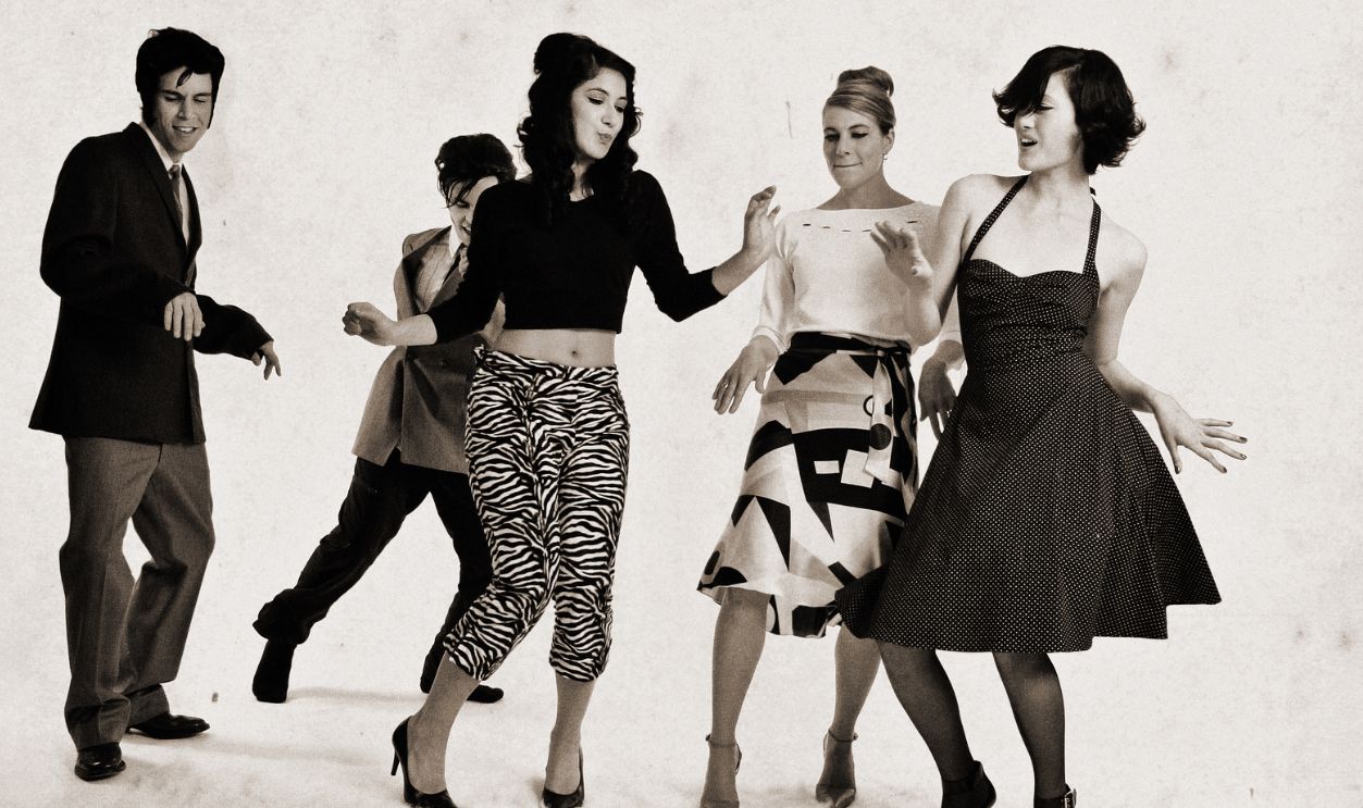 Party - stock photo Fifties (caricature) party. Some effects added for a old fashioned look.