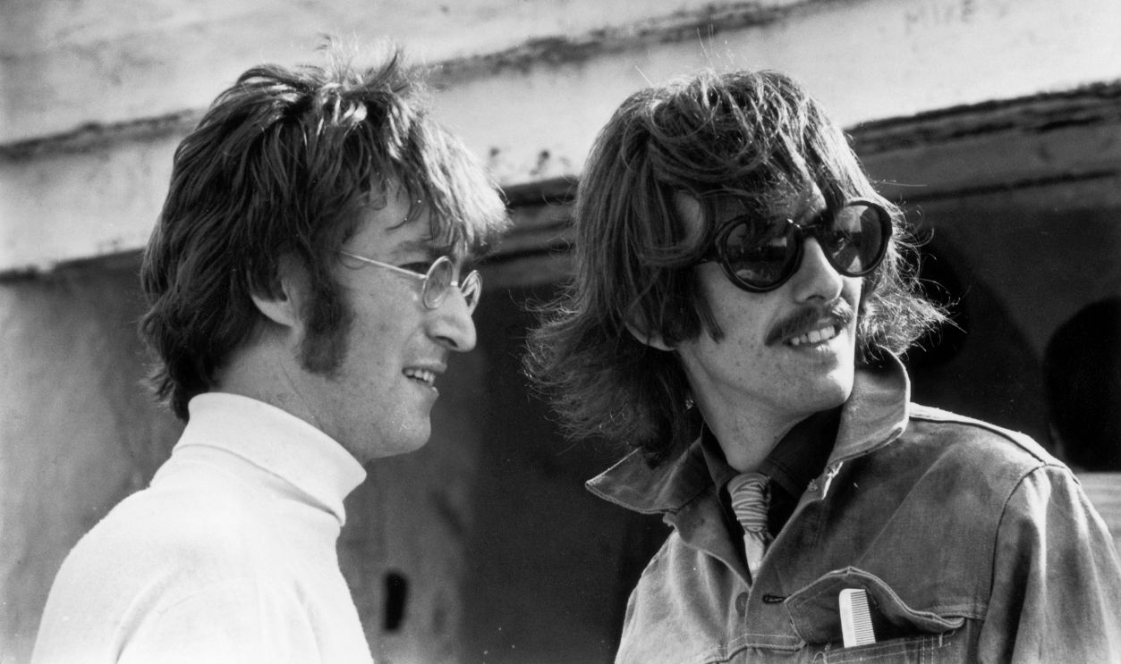 Gettyimages - 3246278, John And George 1967: Beatles John Lennon (1940 - 1980) and George Harrison (1943 - 2001) in Newquay while filming 'The Magical Mystery Tour'. 