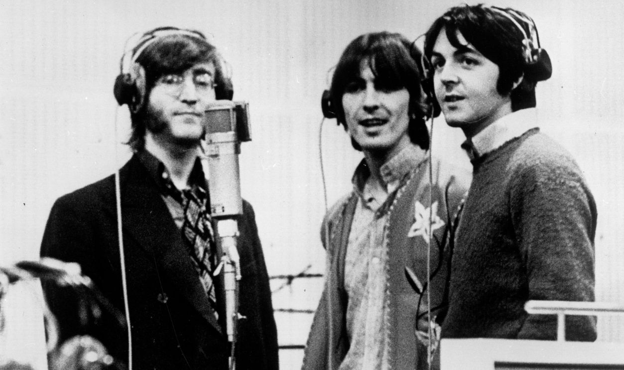 Gettyimages - 3296486, Submarine Beatles 1968: Three Beatles; from left to right John Lennon (1940 - 1980), George Harrison (1943 - 2001) and Paul McCartney, record voices in a studio for their new cartoon film 'Yellow Submarine'.