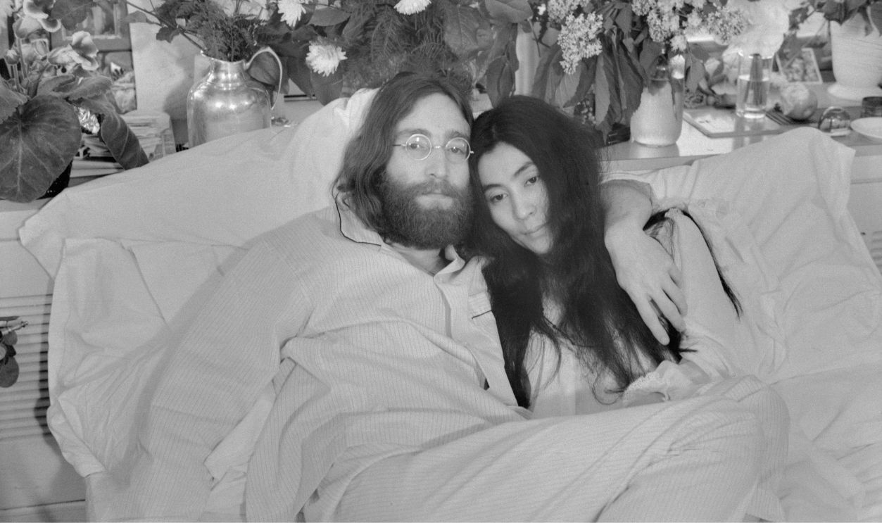 Gettyimages - 515557850, John Lennon and Yoko Ono (Original Caption) Yoko and John...Beatle John Lennon and Yoko Ono, his bride of three months at the time this photo was made in Montreal in June 1969, pose in bed. His first solo album at the time featured songs telling of his love for Yoko.