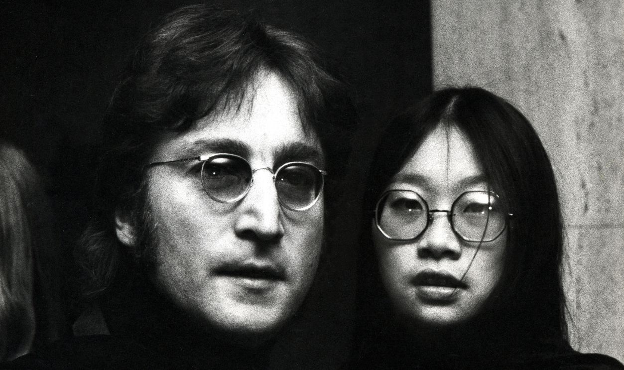 Gettyimages - 104117391,Jim Stacey Benefit John Lennon and May Pang at the Jim Stacey Benefit at Century Plaza Hotel in Los Angeles, California, March 24, 1974.