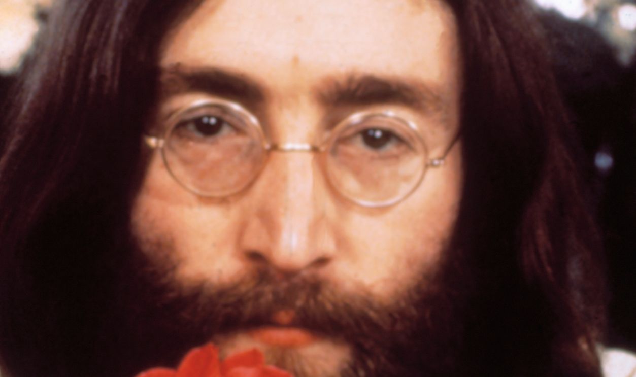 Gettyimages - 515284662, Musician John Lennon With Rose (Original Caption) Head shot of Beatle John Lennon with rose during the