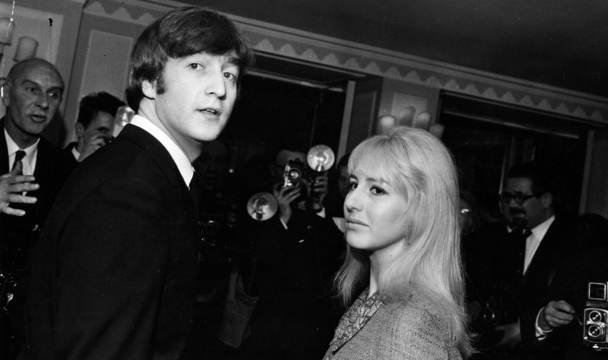 Gettyimages - 3286077, John And Cynthia 23rd April 1964: Singer-songwriter John Lennon (1940 - 1980) of The Beatles, with his wife Cynthia at the Dorchester Hotel, London, for a Foyles Luncheon after the publication of his first book, 'In His Own Write'.