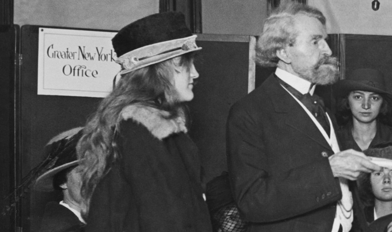 Gettyimages - 1816819198, Camp Andrée Clark Gets The Go-Ahead, 1920 American heiress, artist and philanthropist Huguette Clark stands beside her father, American politician William A Clark as he presents the deed to land for the first National Girl Scout camp, Camp Andree Clark, to Anne Hyde Choate, President of the Girl Scouts, in New York City, New York, 1920. The site was donated by Clark in memory of his daughter, Louise Amelia Andree Clark, herself a Girl Scout.