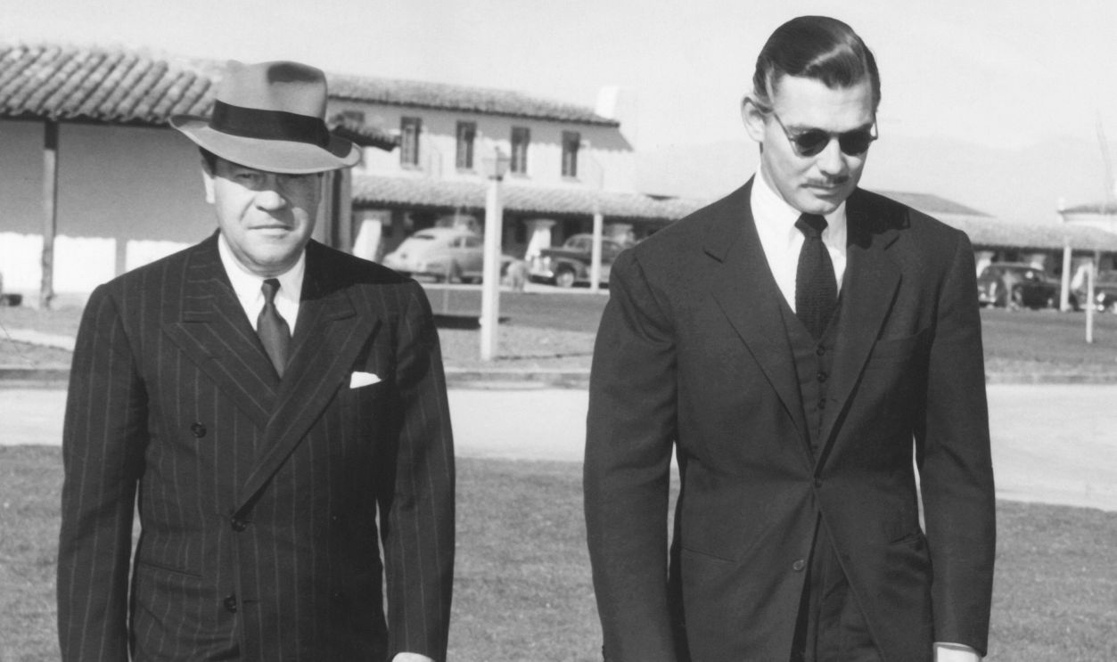 Gettyimages - 2183115146, Mannix & Gable Leave Hotel View of American film executive Eddie Mannix (1891 - 1963) (left) and actor Clark Gable (1901 - 1960) (center), with an unidentified third man, as they leave Gable's hotel, Las Vagas, Nevada, January 1942. Cable had just been informed of the death of his wife, fellow actor Carole Lombard.