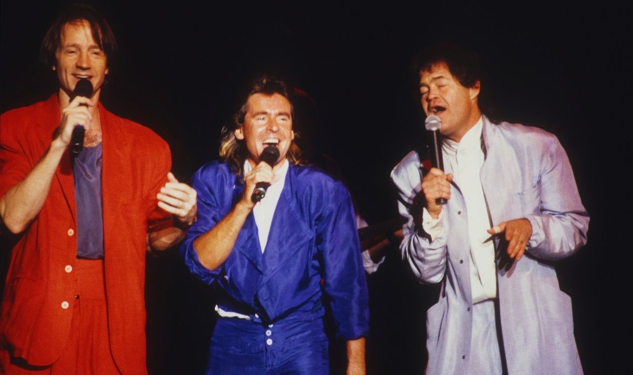 Gettytimages - 1131216577, The Monkees Perform In Minnesota BLOOMINGTON, MN - AUGUST: Rock band the Monkees (L-R) Peter Tork, Davy Jones, and Micky Dolenz performs at the Carlton Dinner Theatre in Bloomington, Minnesota in August 1986.