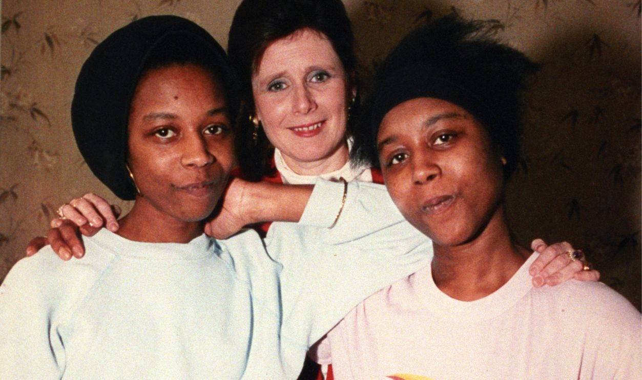 CHIEF EXECUTIVE OF SANE [CENTRE] MARJORIE WALLACE WITH THE LATE JENNIFER GIBBONS [LEFT] & HER TWIN JUNE, DURING A VISIT TO BROADMOOR. JENNIFER, 29, DIED HOURS AFTER SHE WAS TRANSFERRED FROM THE BROADMOOR SPECIAL HOSPITAL FOR TRIAL LEAVE AT A UNIT IN SOUTH WALES.