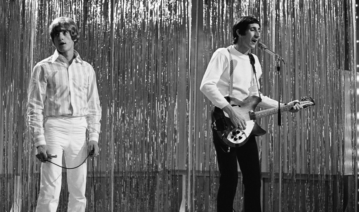 Gettyimages - 2159336782, The Who On 'Top Of The Pops' British singer and musician Roger Daltrey and British guitarist and songwriter Pete Townshend, playing his Rickenbacker Rose-Morris guitar, as British rock band The Who appear on BBC music show 'Top of the Pops,' at Lime Grove Studios in Shepherd's Bush, London, England, 21st September 1966. 