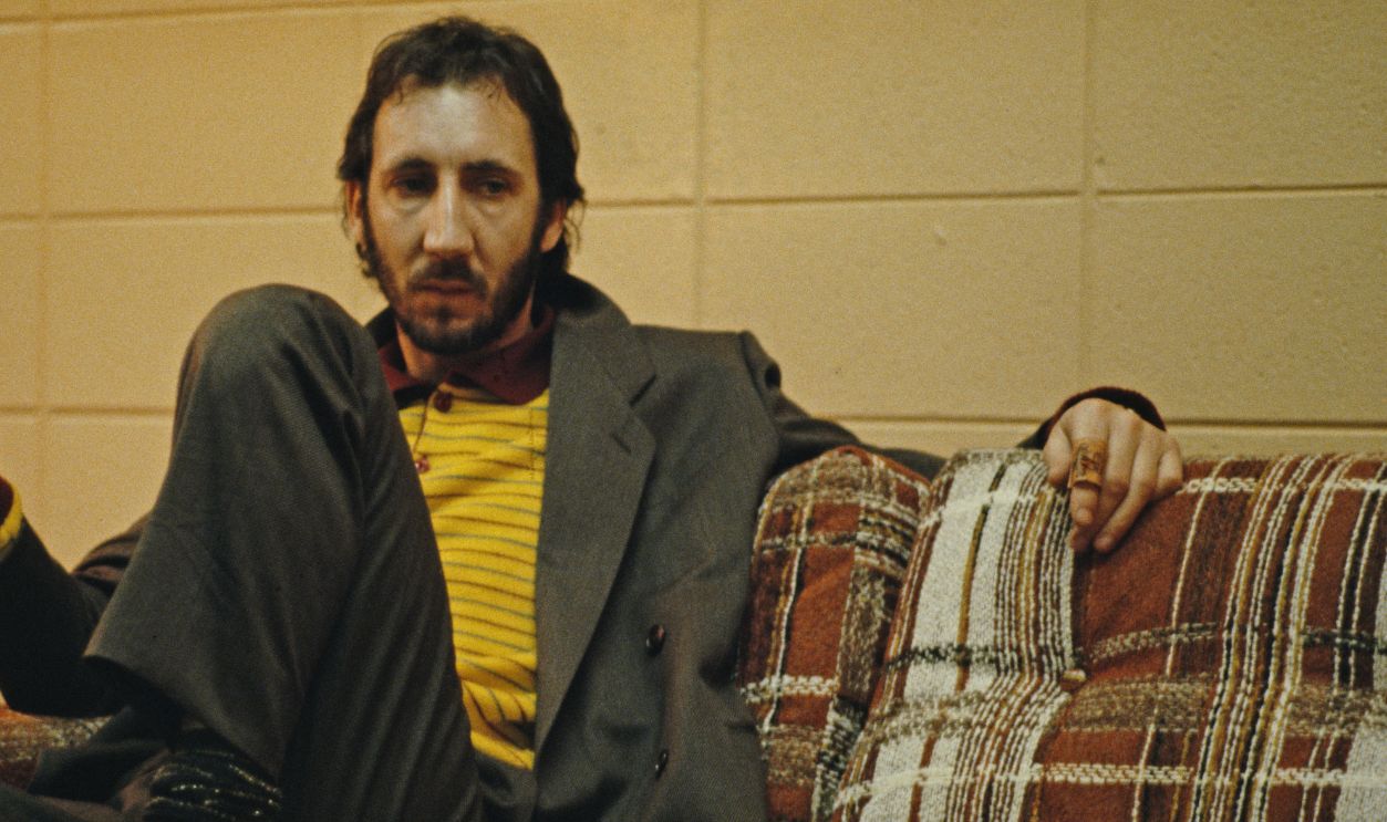 Gettyimages - 1200077871, Pete Townshend Of The Who English guitarist Pete Townshend of The Who relaxes with a drink backstage during the band's tour of the United States in September 1979. 