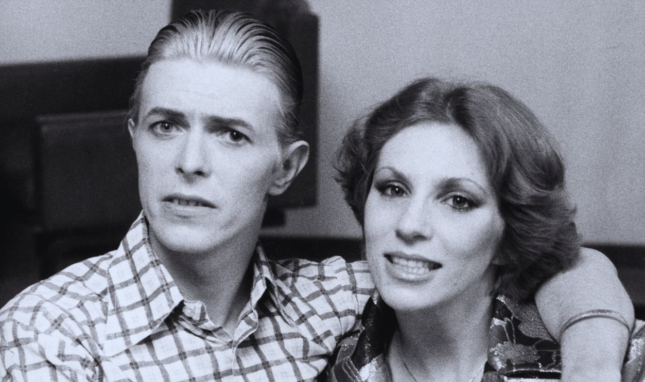 Gettyimages - 892919438, David Bowie David Bowie seen here with his wife Angie during a visit to London in 4th May 1976.