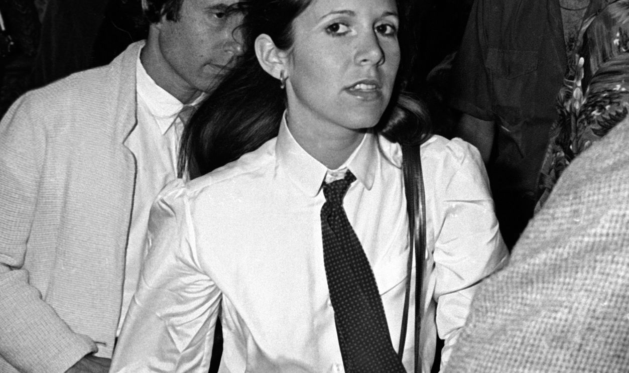 NEW YORK CITY - AUGUST 2: Paul Simon and Carrie Fisher attend the opening of  