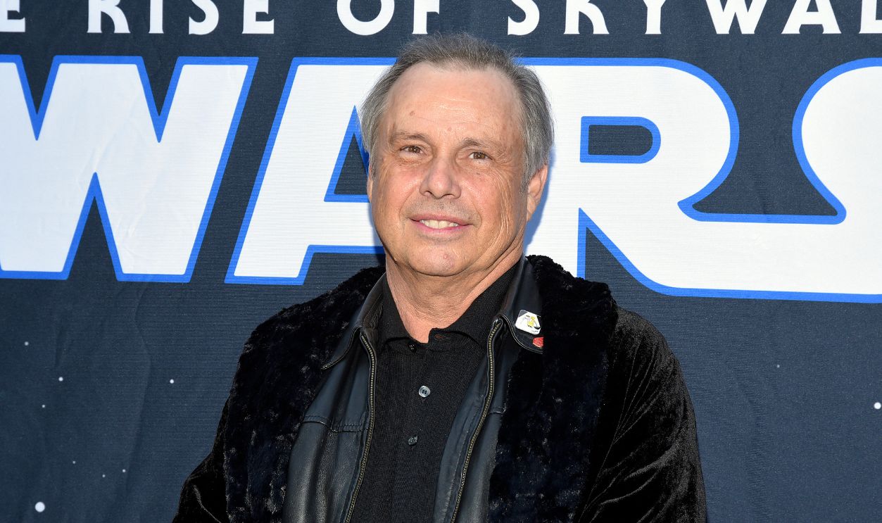 HOLLYWOOD, CALIFORNIA - DECEMBER 19: Todd Fisher, brother of the late actress Carrie Fisher, poses at the IMAX opening of 